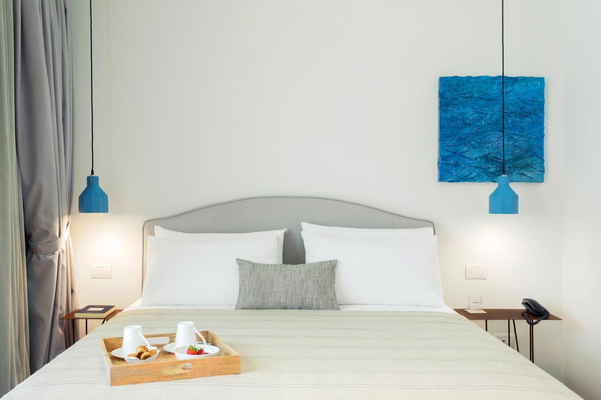 Domia Boutique Hotel E Cucina 몬델로 객실 사진